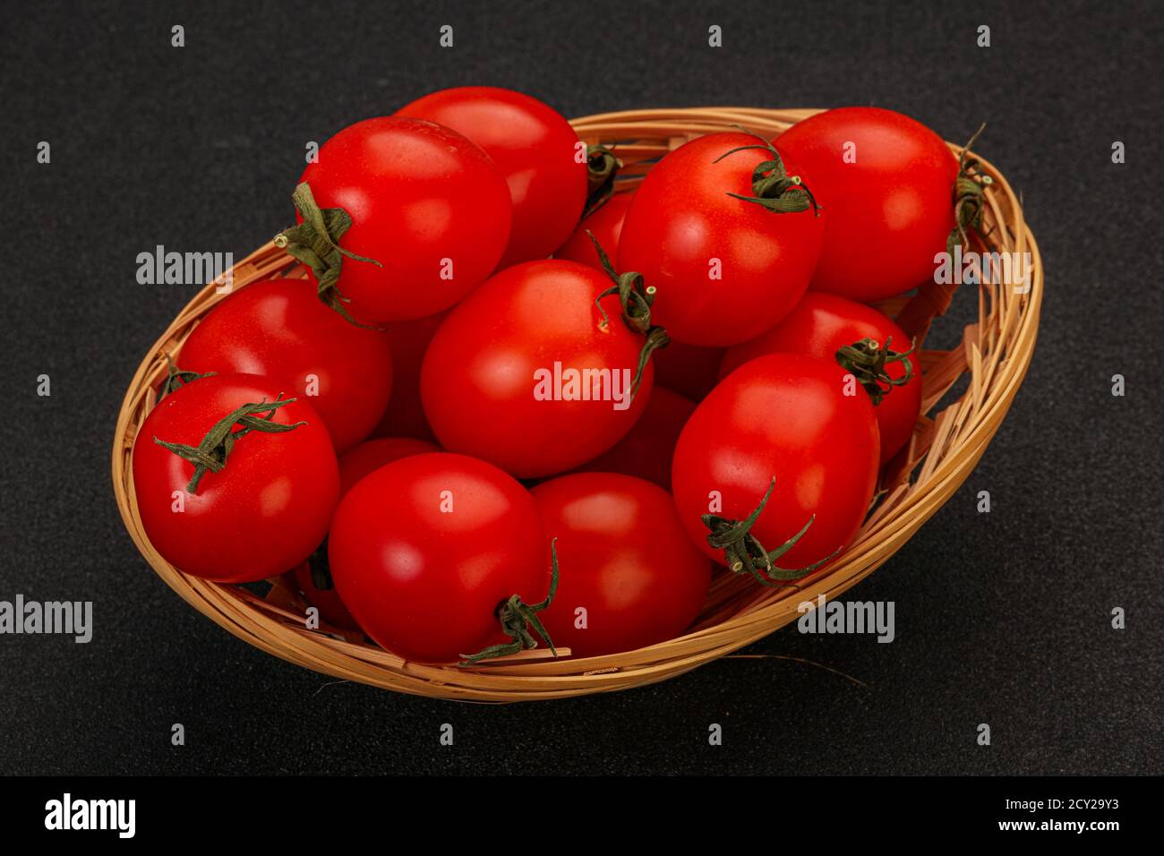 Ripe juicy red cherry tomato in the bowl Stock Photo - Alamy