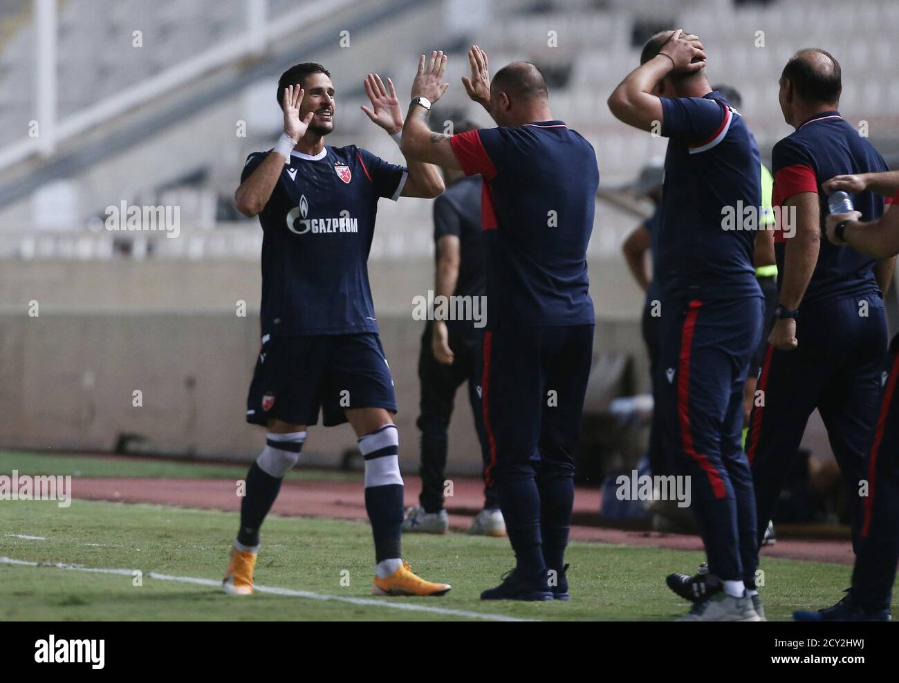 Soccer Football - Europa League - Play-off - Ararat-Armenia v Crvena zvezda - GSP Stadium, Strovolos, Cyprus - October 1, 2020. Crvena zvezda's Diego Falcinelli celebrates scoring their second goal with coach