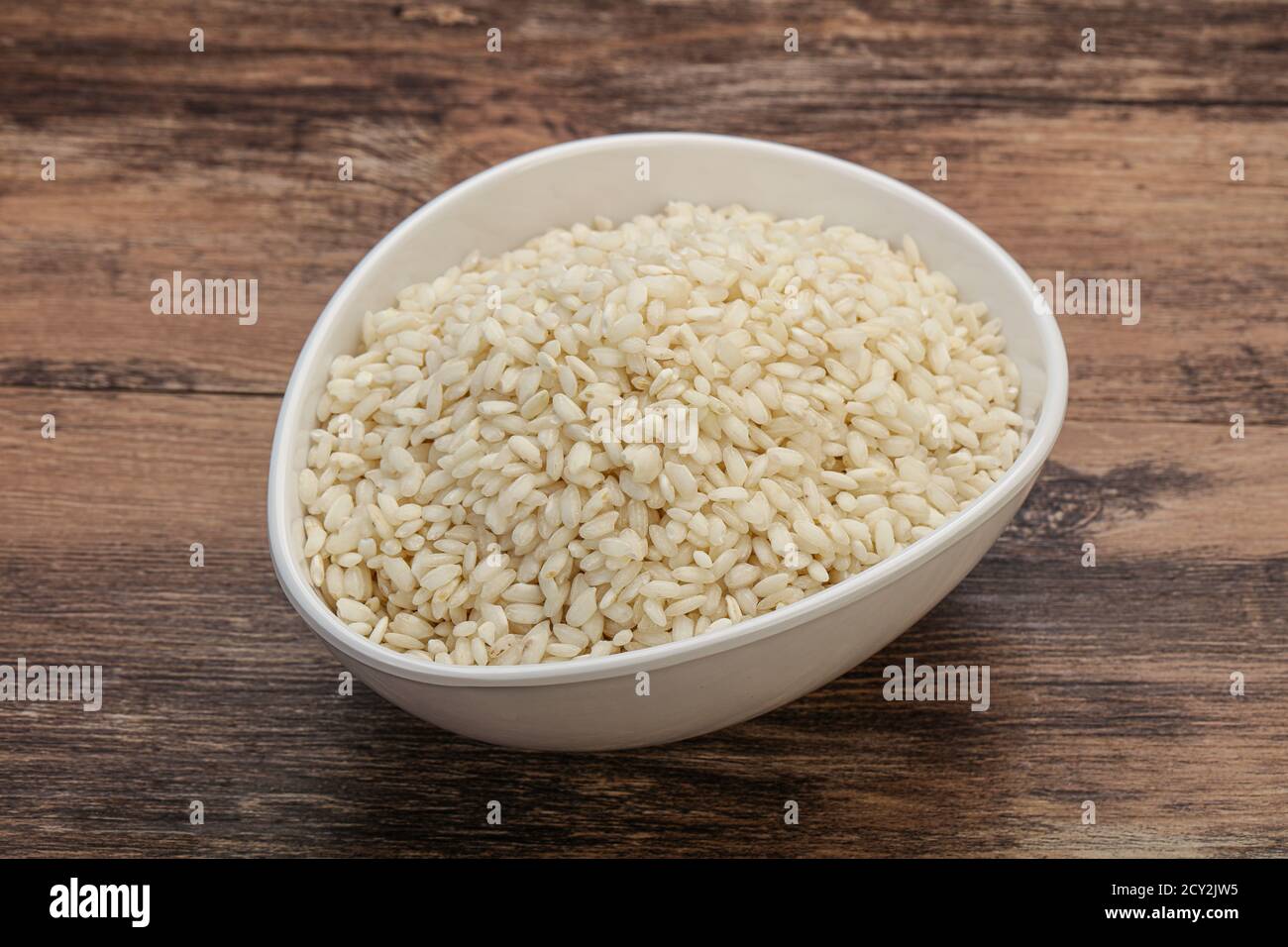 Raw Italian arborio rice for Risotto Stock Photo - Alamy