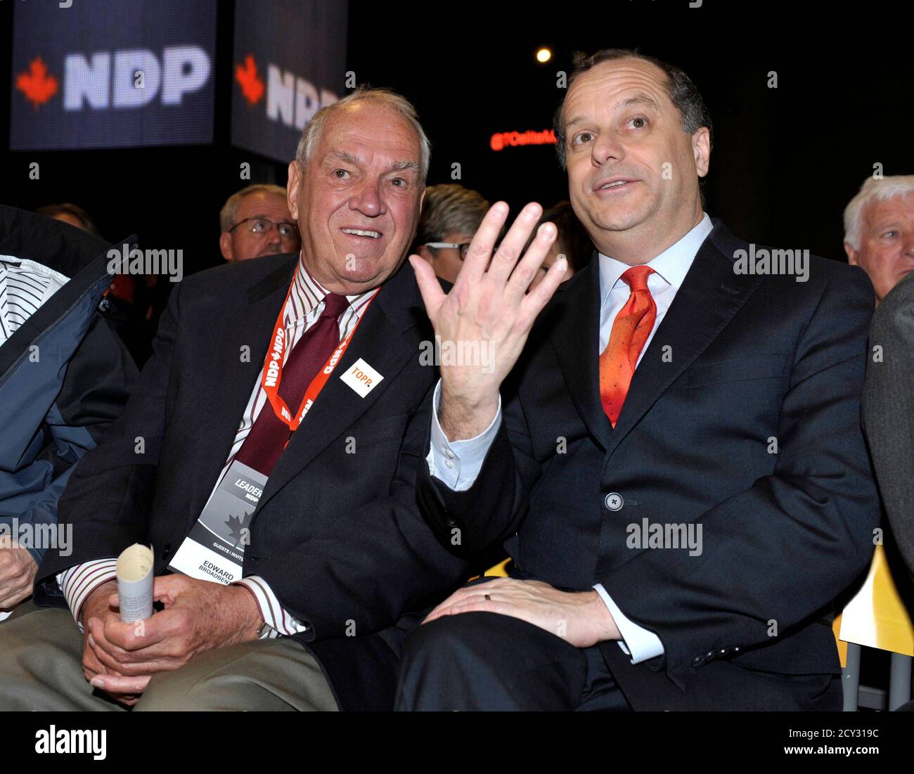 Leadership candidate Brian Topp talks with former NDP Leader Ed Broadbent (L) during the NDP Leadership Convention in Toronto March 23, 2012. The NDP are electing a new leader to replace