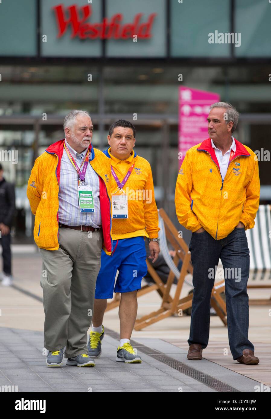 Members of the Colombian Olympic Team walk in the Westfield Shopping Centre, a major gateway for visitors to the London 2012 Olympic Park, in Stratford, east London, July 19, 2012. REUTERS/Neil Hall (BRITAIN - Tags: SPORT OLYMPICS) Stock Photo