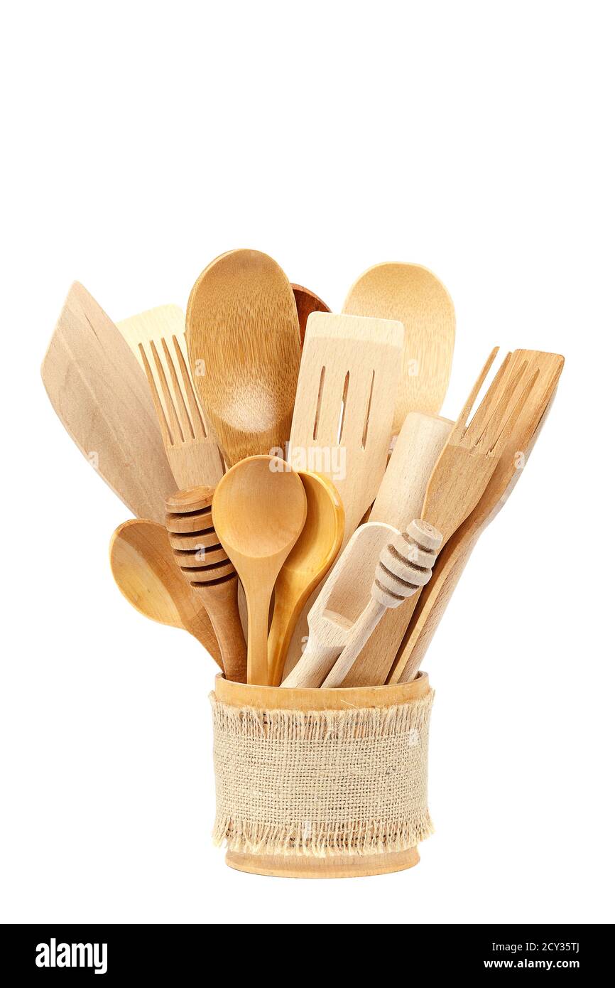 Wooden kitchen utensils isolated on white background Stock Photo - Alamy