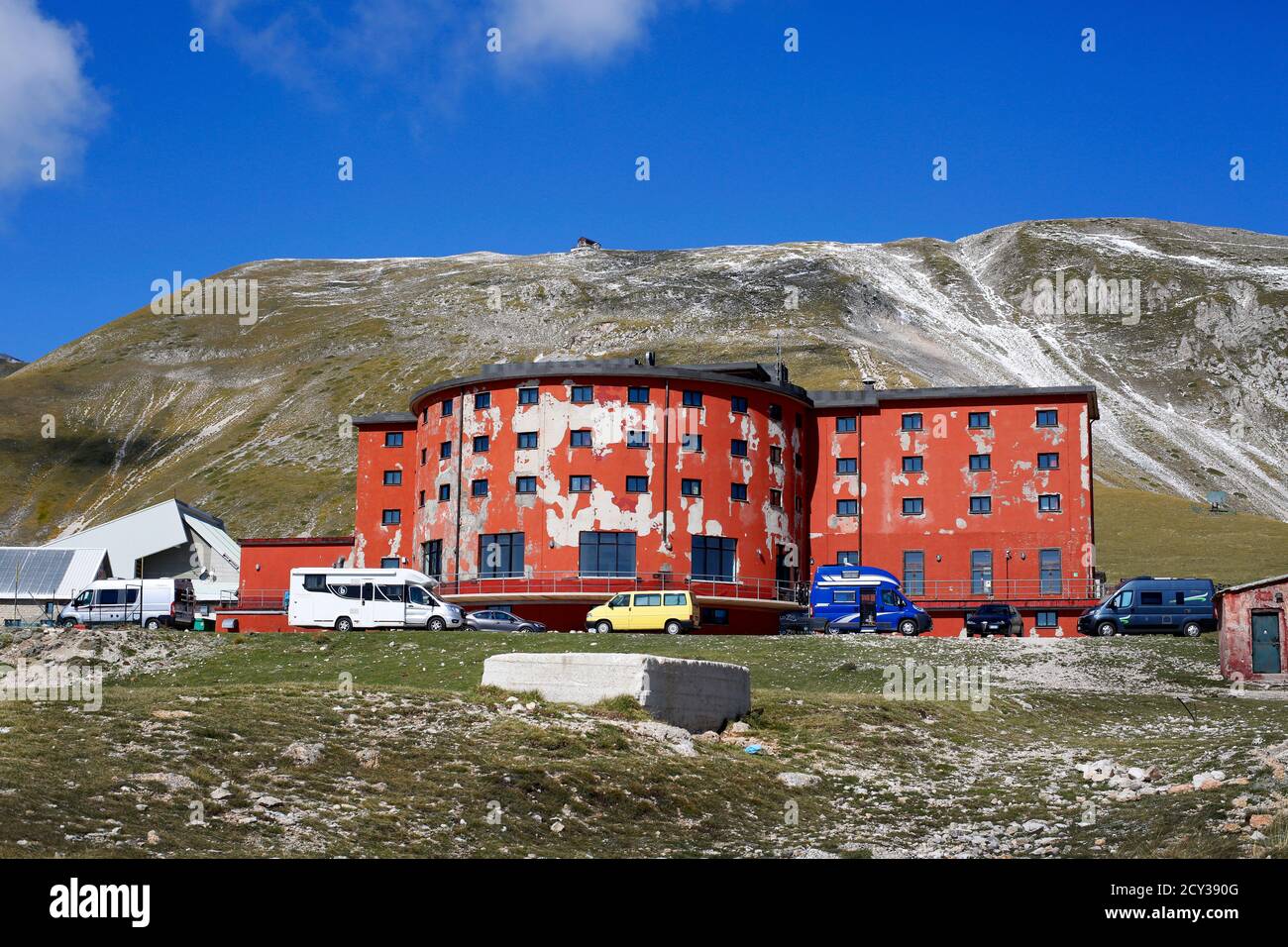 Campo Imperatore in the Gran Sasso, Abruzzo, Italy. Hotel Campo Imperatore is the red building. Stock Photo