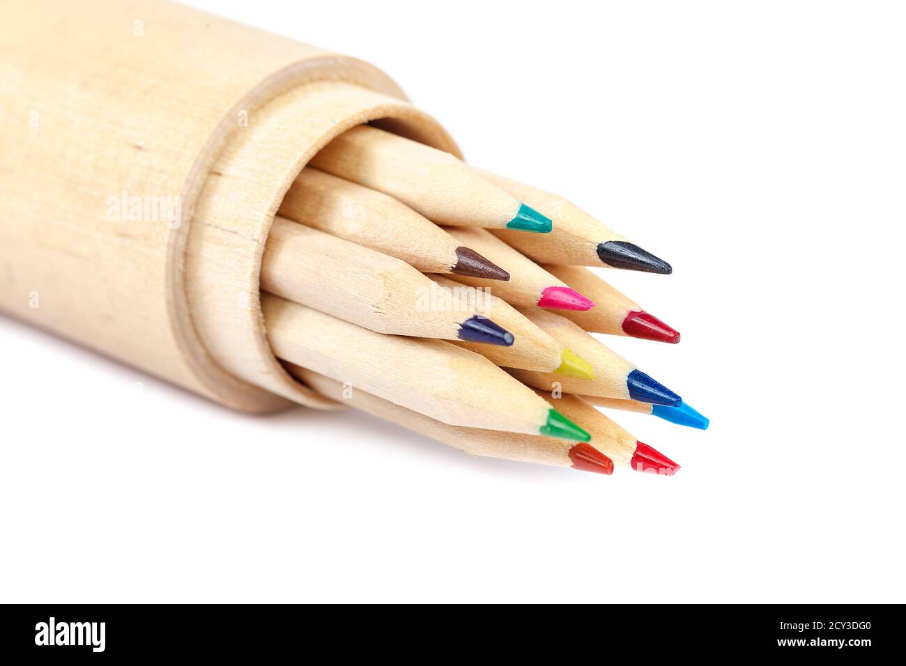 Colored pencils in a wooden box isolated on white background. Stock Photo