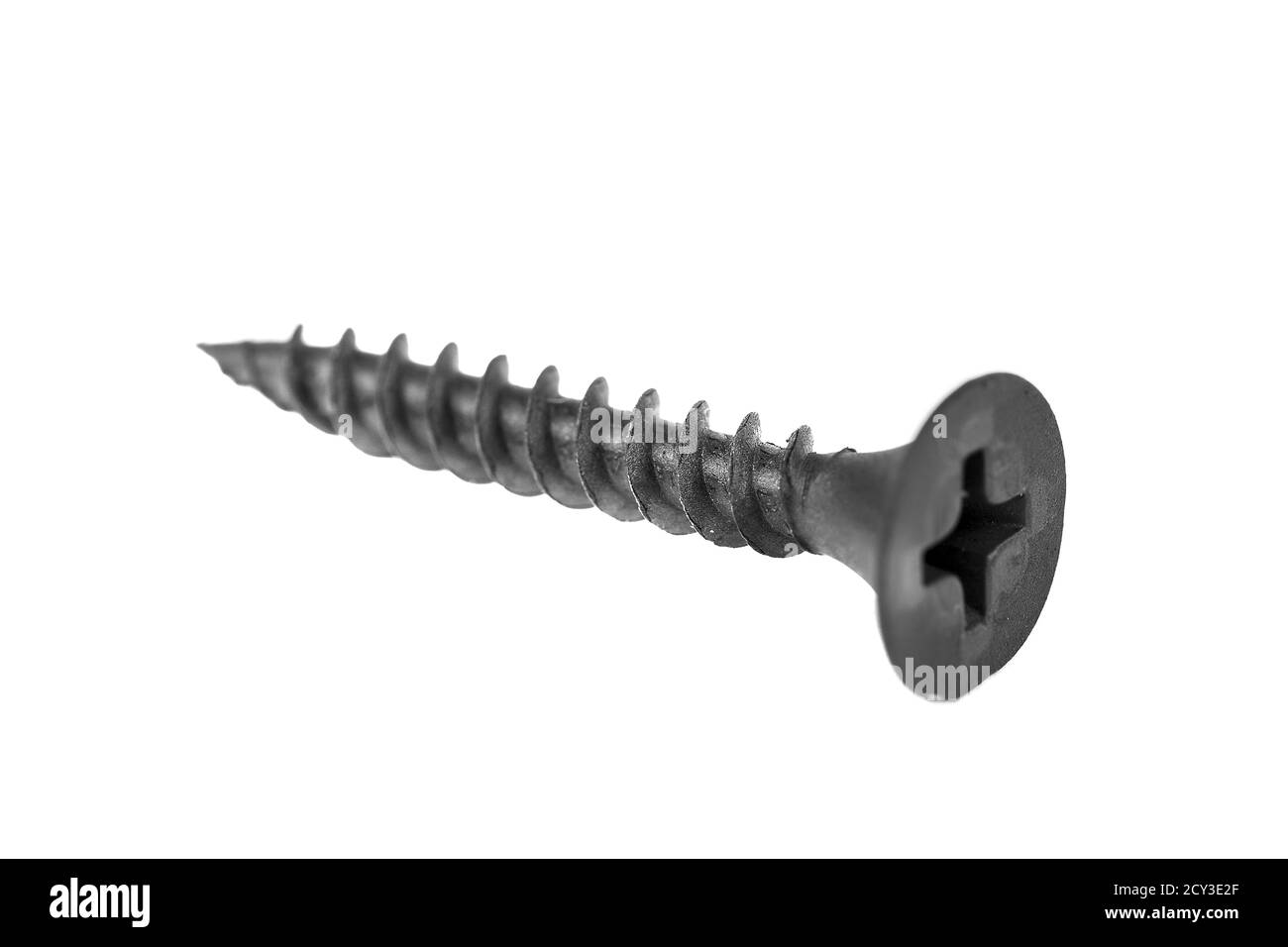 Metal self-tapping or screw close-up isolated on white background. Stock Photo