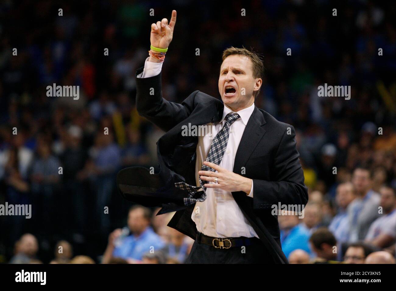 Oklahoma City Thunder head coach Scott Brooks instructs his team against  the San Antonio Spurs in the second half of their NBA basketball game in  Oklahoma City, Oklahoma April 4, 2013. REUTERS/Bill