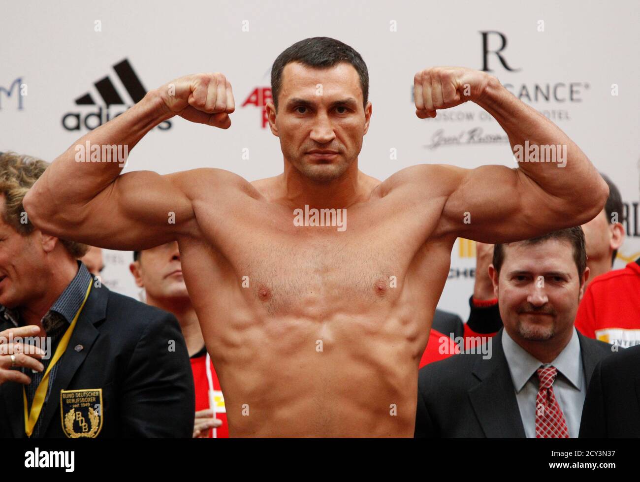 Heavyweight boxing world champion Vladimir Klitschko (C) of Ukraine attends  an official weigh-in on the eve of the title fight against challenger  Alexander Povetkin of Russia in Moscow, October 4, 2013. REUTERS/Maxim