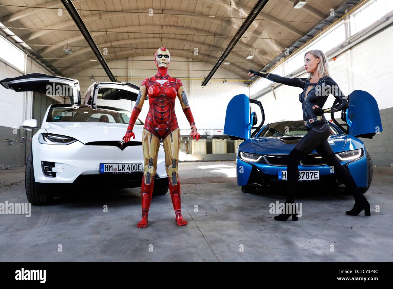 GEEK ART - Bodypainting and Transformaking: Iron Woman and Black Widow photoshooting with René-Claire Meinkold and Karo Zett at the elektroma site in Hamelin on September 30, 2020 - A project by the photographer Tschiponnique Skupin and the bodypainter Enrico Lein Stock Photo