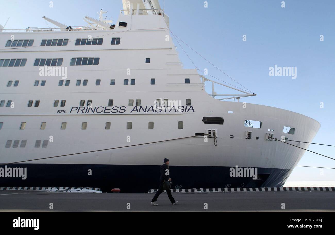 A Man Passes By Princess Anastasia Cruising Ferry At A Sea Port In St Petersburg March 31 2011 St Peter Line A Shipping Company Which Deals With Services From Helsinki St Petersburg