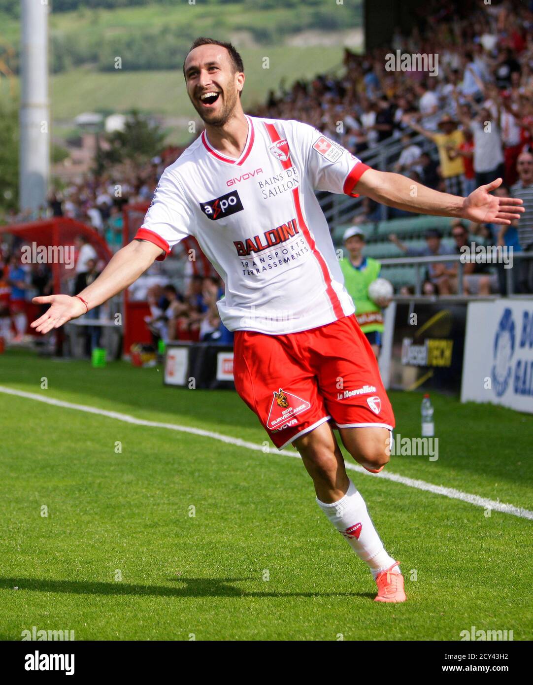 FC Sion's Dragan Mrdja celebrates his goal during his Swiss Super League  promotion and relegation soccer match against FC Aarau in Sion, May 26,  2012. REUTERS/Valentin Flauraud (SWITZERLAND - Tags: SPORT SOCCER
