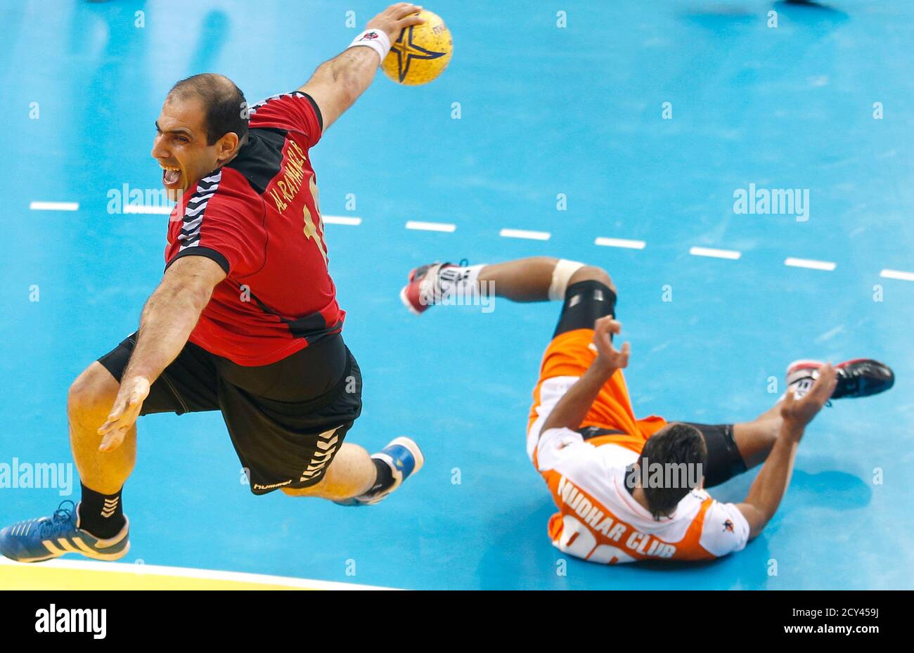 Bassel Alrayes L Of Qatar S Al Rayyan Tries To Score Next To Abbas Alsaffar Of Saudi Arabi S Mudhar During The Asian Handball Club Championship In Doha November 10 2012 Reuters Fadi Al Assaad Qatar Tags
