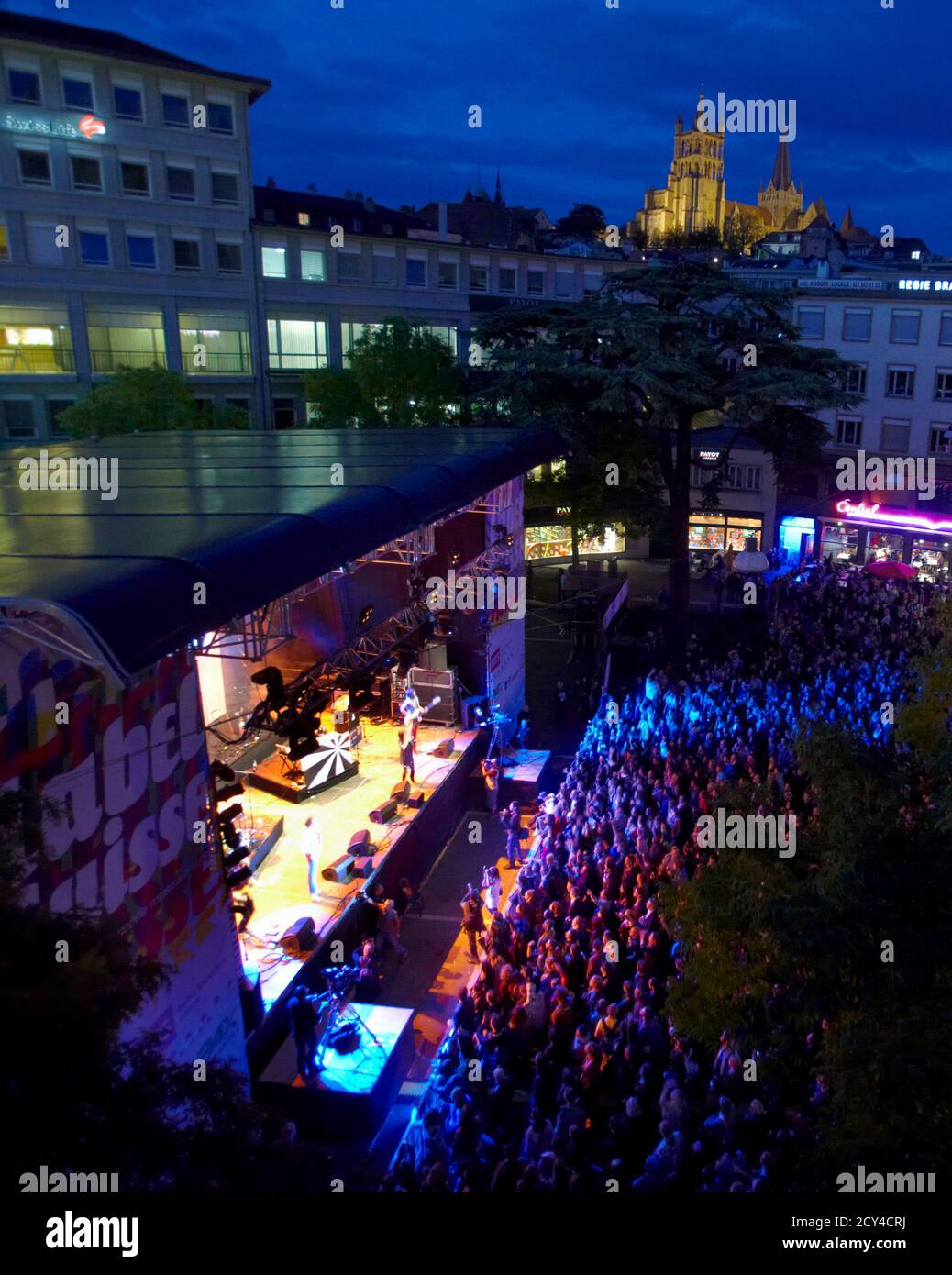 Spectators attend a concert during the Label Suisse music festival in  Lausanne September 17, 2010. The Label Suisse Festival is organised by the Swiss  Radio and Television to promote over 150 artists