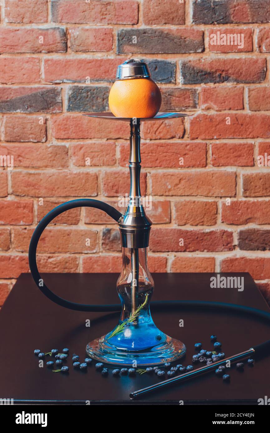 Stylish hookah with aroma grapefruit for relax. grapefruit shisha