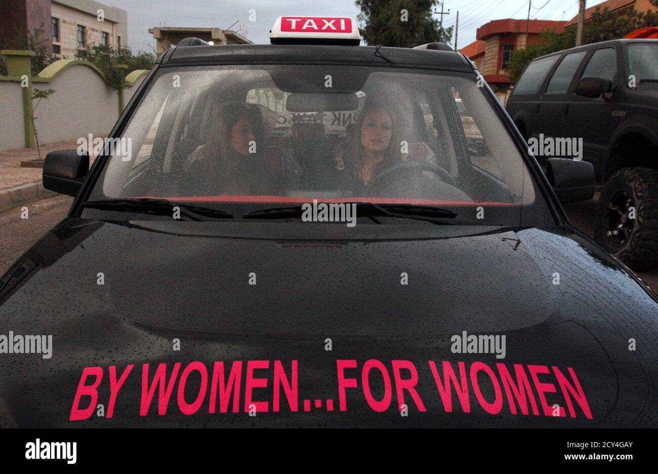 Dubai ladies taxi hires stock photography and images Alamy