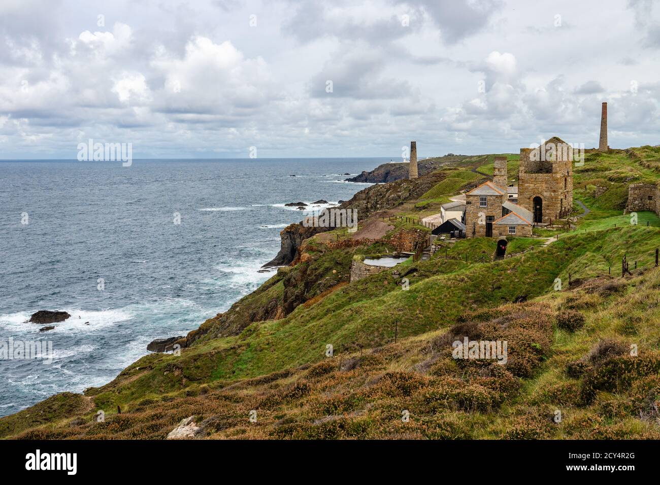 Abandoned tin mine buildings on cliff top Stock Photo