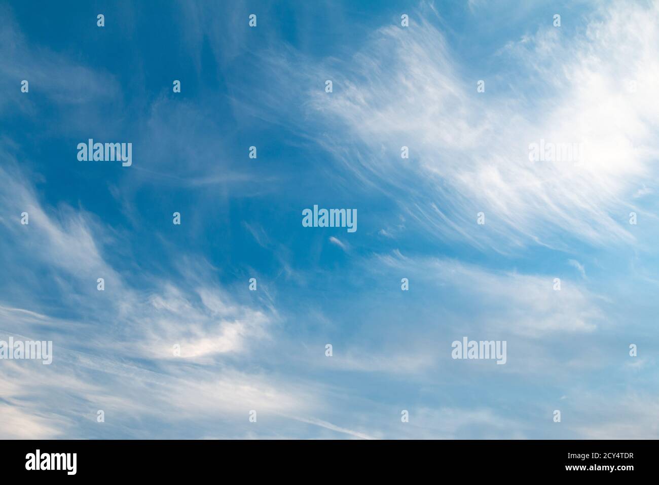 beautiful blue sky with clouds, nature background, film grain noise effect Stock Photo