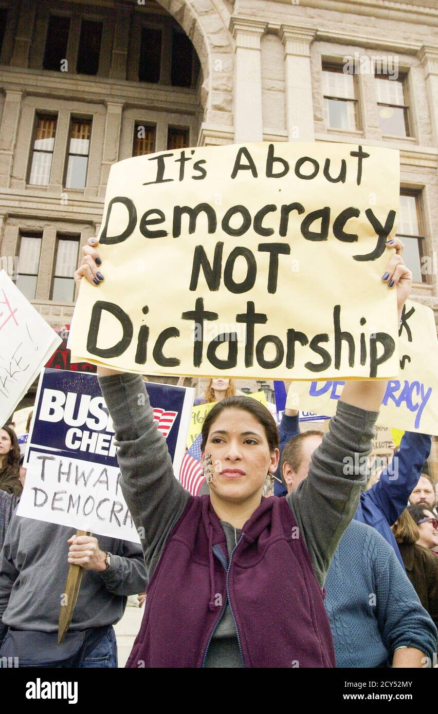 Austin, Texas USA November 11, 2000: FILE Protesters at the Texas Capitol denounce Republican George W. Bush's effort to dismiss Florida's recount of the . presidential votes that will determine the winner Austin, Texas USA November 11, 2000: FILE Protesters at the Texas Capitol denounce Republican George W. Bush's effort to dismiss Florida's recount of the . presidential votes that will determine the winner