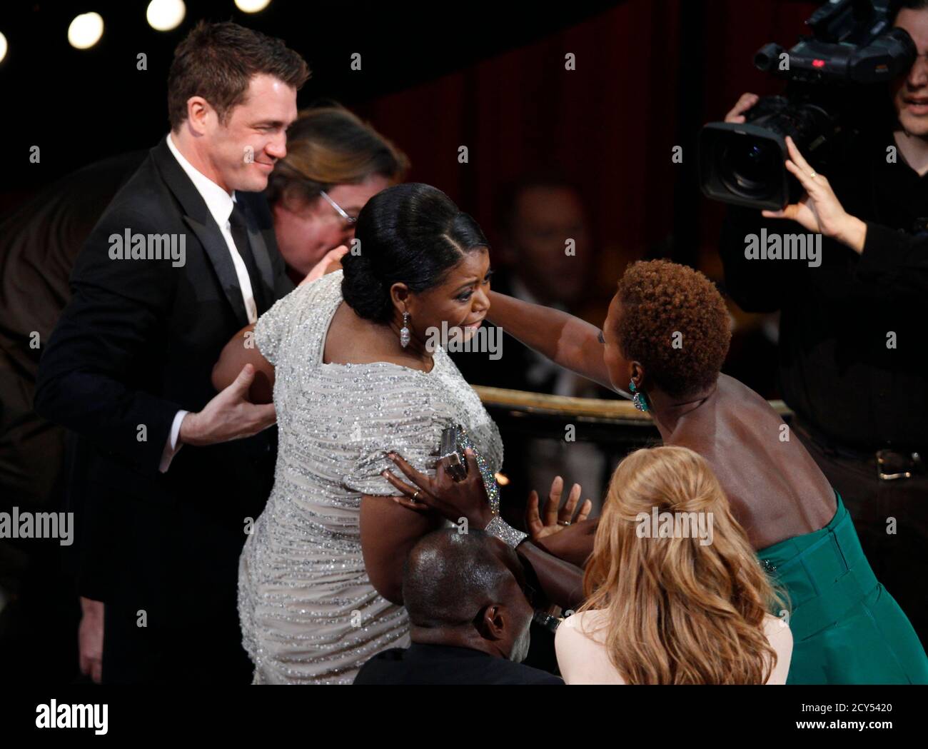 Octavia spencer with the supporting actress award for the help hires