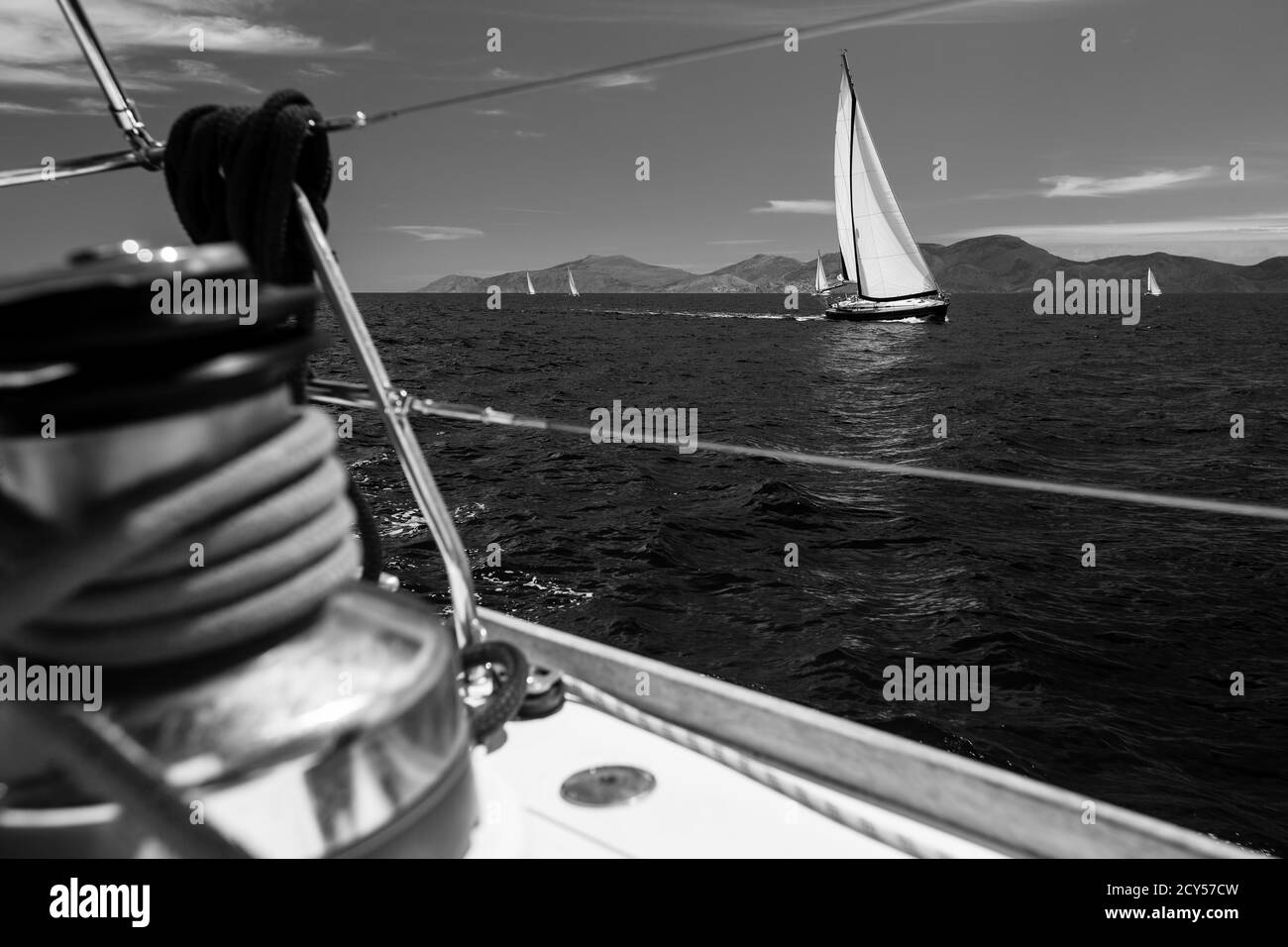 Luxury sailing. Boats in the regatta in the Aegean Sea. Black and white photo. Stock Photo