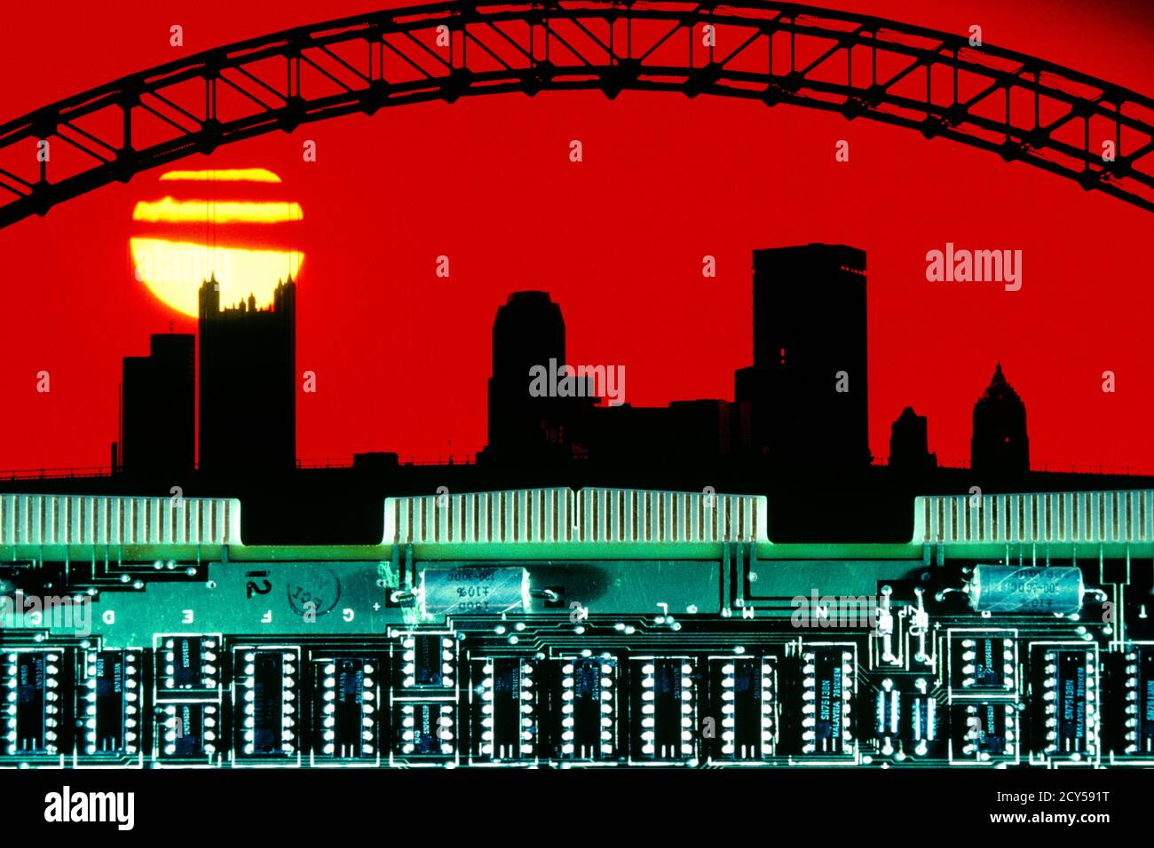 1980s COMPUTER CIRCUIT BOARD RED YELLOW SUNSET AND SILHOUETTED CITY SKYLINE OF PITTSBURGH PA  - ks24709 GER002 HARS INNOVATION OPPORTUNITY KEYSTONE MID-ATLANTIC REAL ESTATE CONCEPTUAL STRUCTURES SUNRISE CITIES KEYSTONE STATE EDIFICE MID-ATLANTIC STATE SYMBOLIC CIRCUIT CREATIVITY GROWTH IRONWORK SOLUTIONS BRIDGES COMPUTING OLD FASHIONED PITTSBURGH Stock Photo