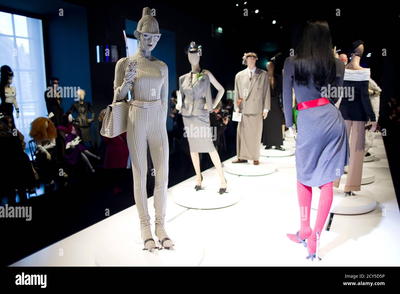 Mannequins displaying creations by designer Jean Paul Gaultier are seen  during the press visit of the Jean Paul Gaultier Exhibition at the Grand  Palais in Paris, March 30, 2015. The Jean Paul
