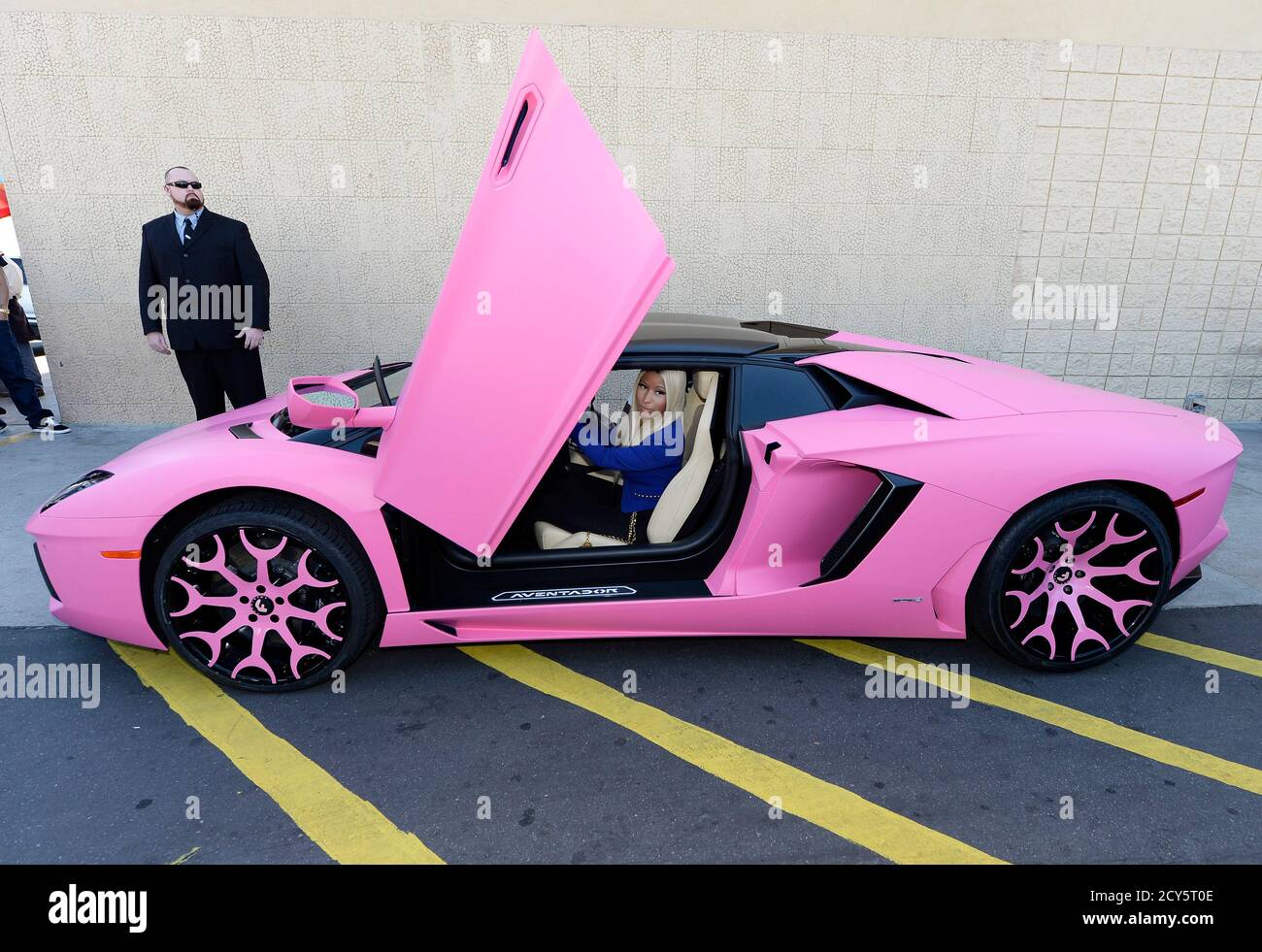 Nicki Minaj rides her 2014 Lamborghini Aventador Roadster after launching  her fashion line at Kmart in Los Angeles, California October 15, 2013.  REUTERS/Kevork Djansezian (UNITED STATES - Tags: FASHION ENTERTAINMENT  BUSINESS Stock Photo - Alamy