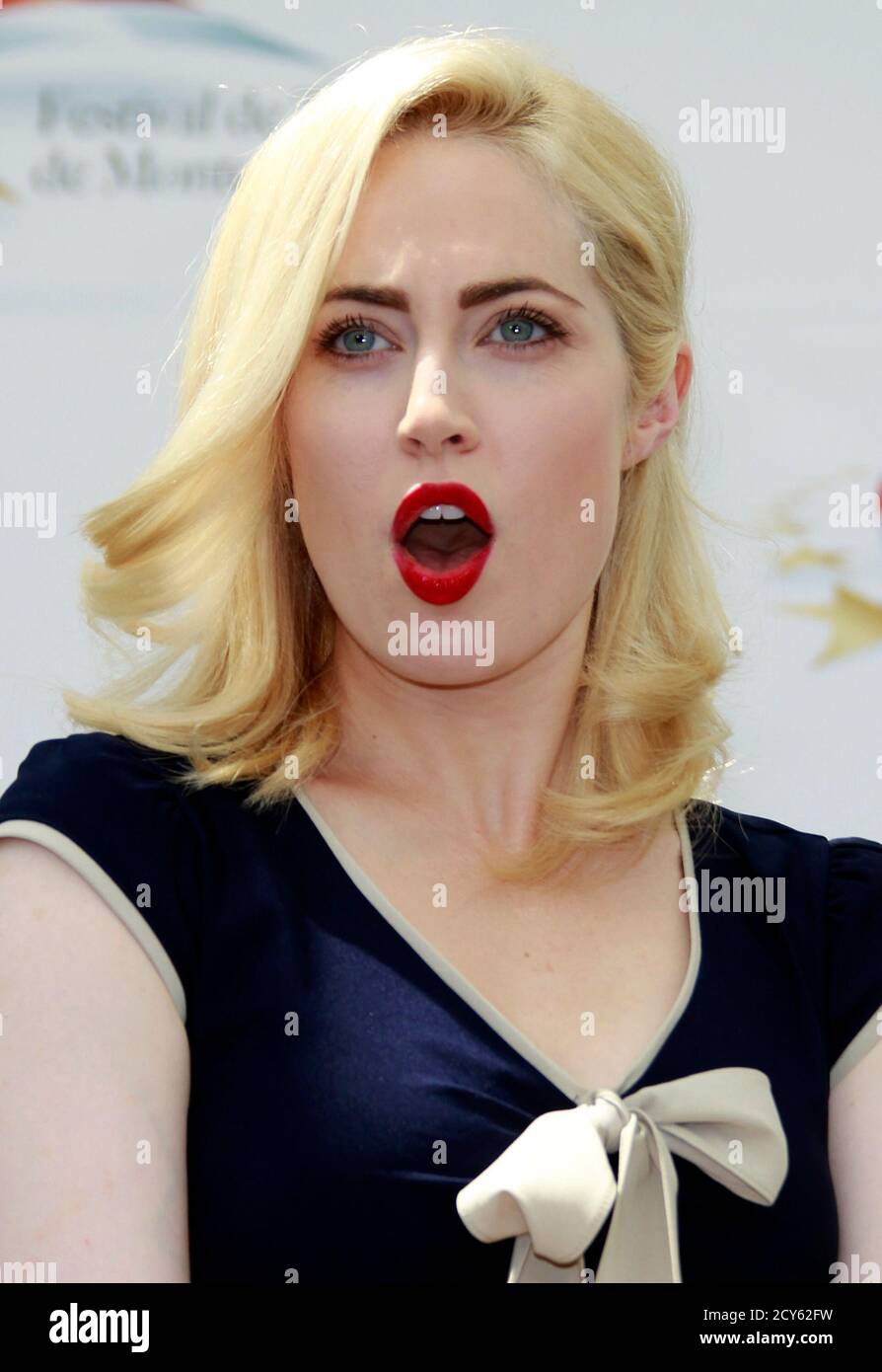 Actress Charlotte Sullivan Who Stars In The Television Series Rookie Blue Reacts During A Photocall At