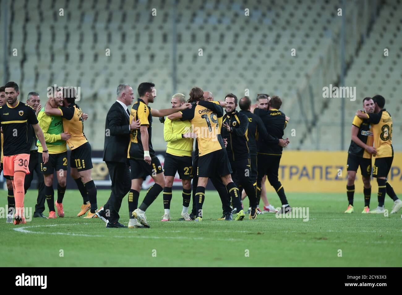 Athen, Greece. 01st Oct, 2020. Football: Europa League qualification, AEK  Athens - VfL Wolfsburg, 4th round in the Olympic Stadium "Spyros Louis".  Players from Athens celebrate their victory. Credit: Angelos  Tzortzinis/dpa/Alamy Live