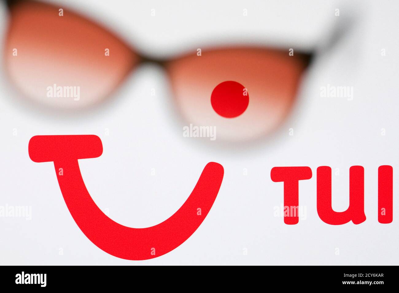 The logo of German tourism group TUI AG, owner of Europe's largest travel  company TUI Travel, is pictured on a computer screen through sunglasses in  this illustration picture taken in Lavigny May