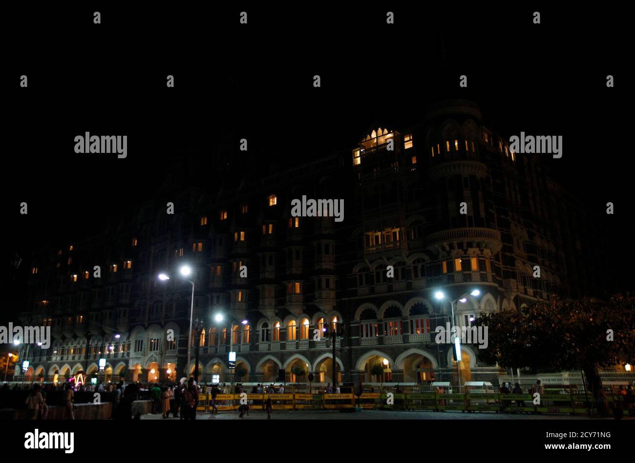 The Taj Hotel is pictured after lights were turned off for Earth Hour in Mumbai March 26, 2011. Lights started going off around the world on Saturday in a show of support for renewable energy, given added poignancy by Japan's nuclear disaster which raises doubts about nuclear power as a possible solution.  REUTERS/Danish Siddiqui (INDIA - Tags: ENVIRONMENT TRAVEL CITYSCAPE ANNIVERSARY ENERGY) Stock Photo