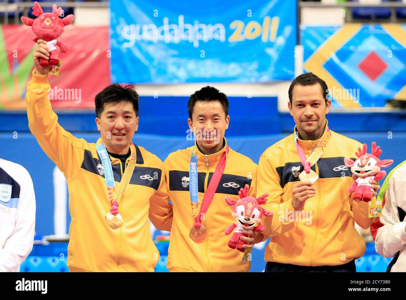 L R Hugo Hoyama Gustavo Tsuboi And Thiago Monteiro Of Brazil Celebrate Their Gold Medal In Men S Tennis Table Team Event At The Pan American Games In Guadalajara October 17 2011 The Games