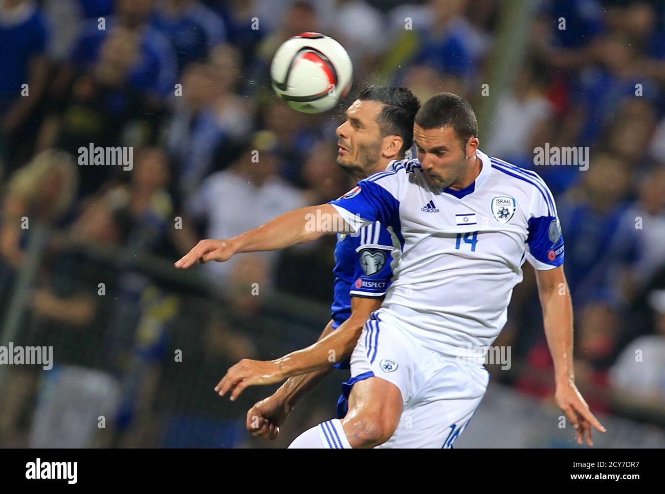 Bosnia S Emir Spahic Fights For The Ball Against Israel S Ben Sahar R During Their Euro 16 Qualifying Soccer Match In Zenica Bosnia And Herzegovina June 12 15 Reuters Dado Ruvic Stock Photo Alamy