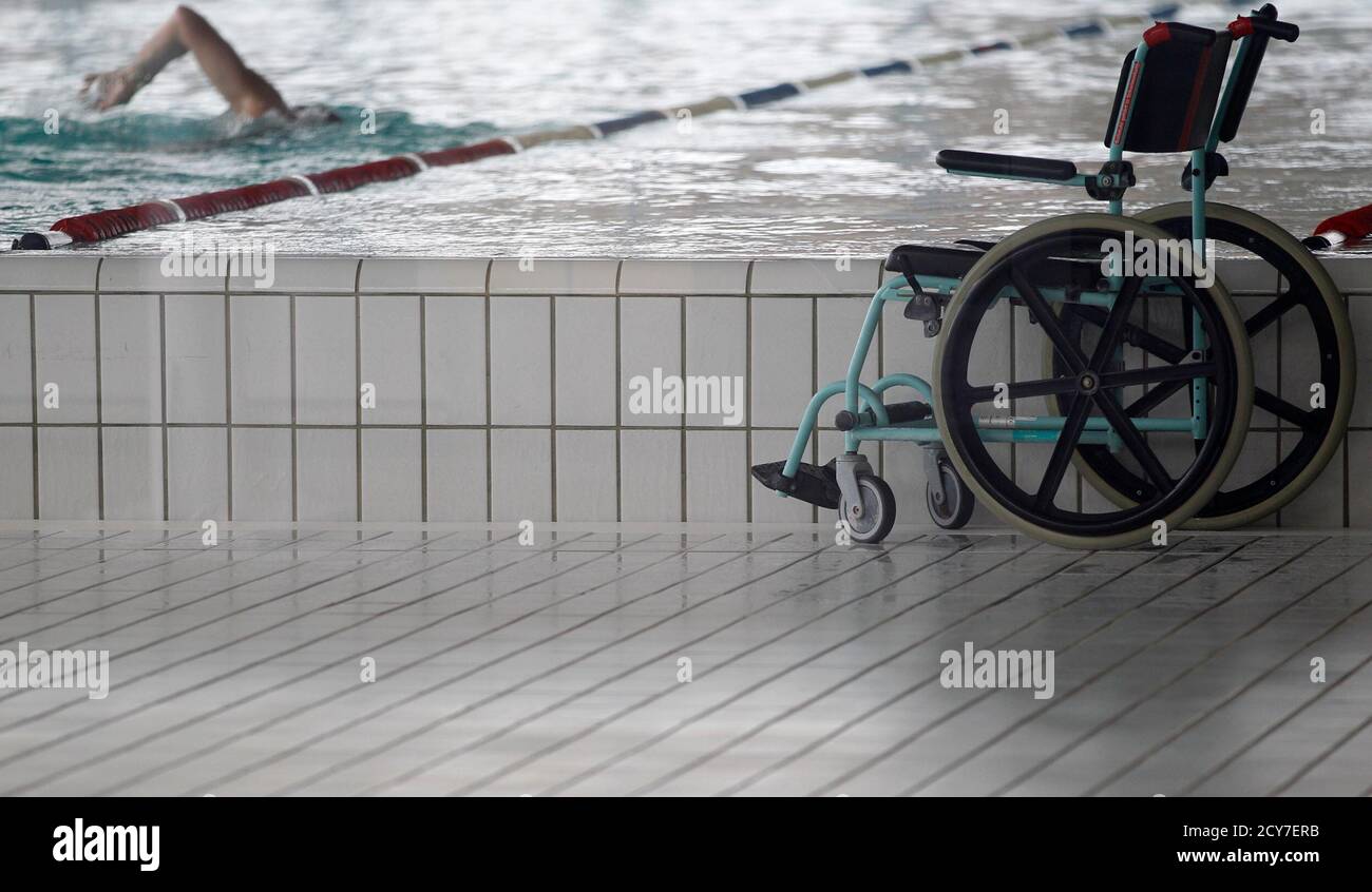 A patient attends a rehabilitation session in a swimming pool at Swiss  Paraplegics Centre in Nottwil, December 13, 2010. TV game show contestant  Samuel Koch is treated at the Swiss hospital after