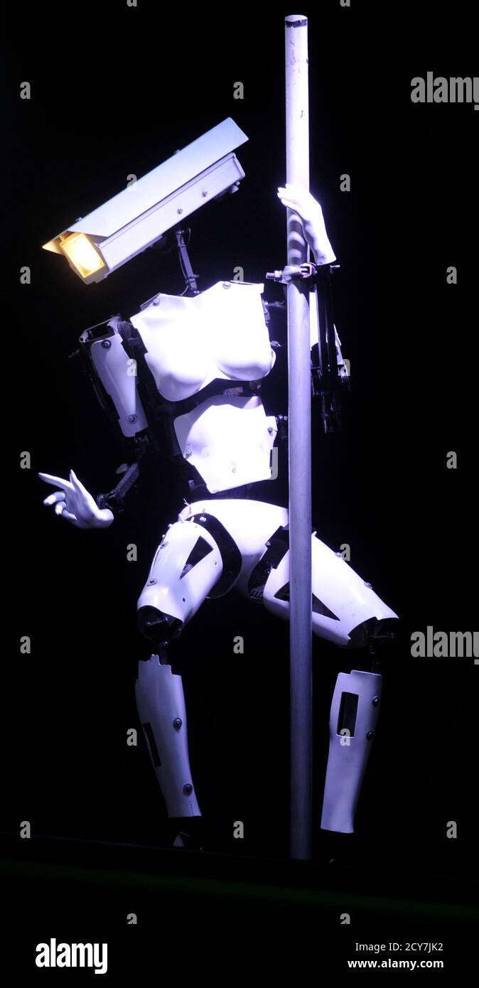 A pole dancing robot is pictured during preparations at the CeBit computer  fair in Hanover, March, 5, 2012. The biggest fair of its kind open its  doors to the public on March