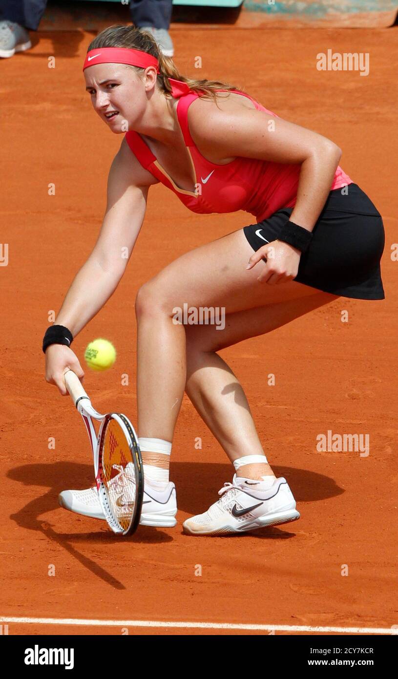Irena Pavlovic of France returns the ball to Arabel Medina Garrigues of  Spain during the French Open tennis tournament at the Roland Garros stadium  in Paris May 30, 2012. REUTERS/Regis Duvignau (FRANCE -