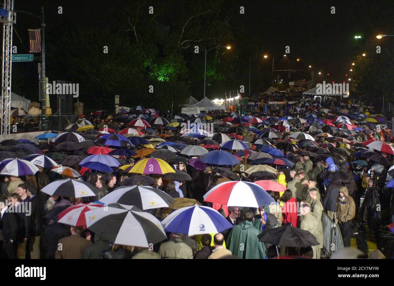 Austin, Texas 08NOV00:  A large crowd gathers in the rain in downtown Austin, Texas at 11th and Congress to celebrate Texas Governor George W. Bush's early lead in the U.S. presidential race. The race was too close to call early Wednesday. Stock Photo