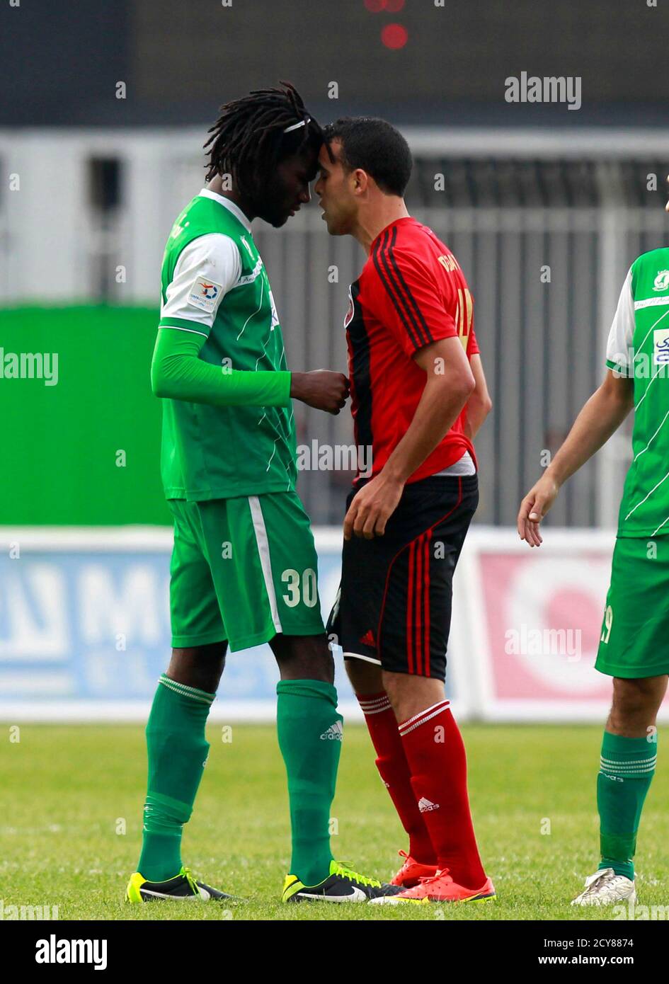 Lamouri Djediat R Of Algeria S Usm Alger Reacts With Murtadha Fall Of Kuwait S Al Arabi During The Union Of Arab Football Associations Uafa Final Soccer Match In Algiers May 14 2013 Reuters Louafi Larbi