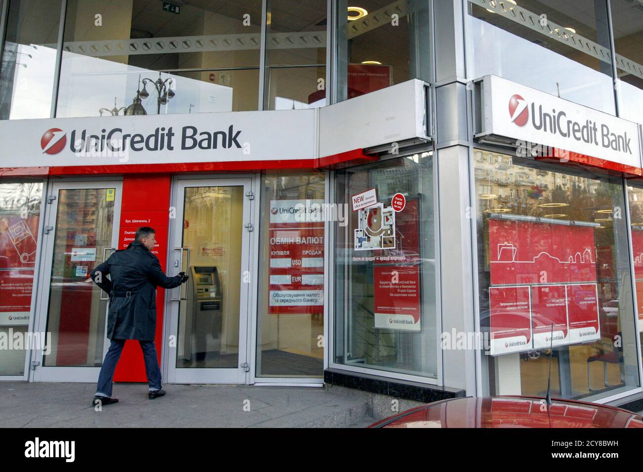 A man enters a branch office of UniCredit Bank in Kiev September 25, 2014.  There is no retreating from central and eastern Europe (CEE) for Austrian  banks who have spent fortunes over