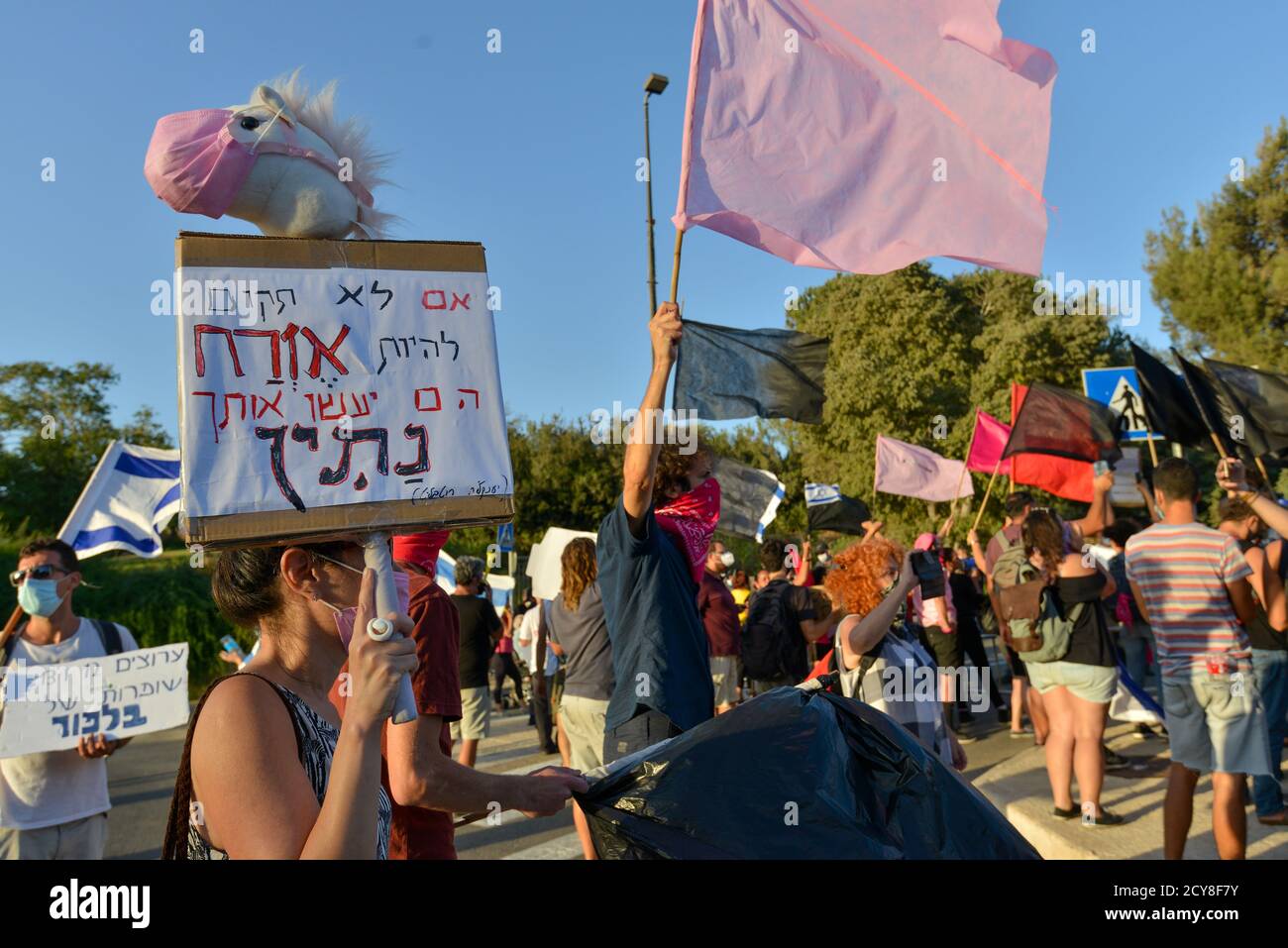 29 Sep 2020 - Anti-corruption protest against Prime Minister Netanyahu in front of the Knesset, Israeli house of elected. Hundreds of vehicles climbed their way to Jerusalem - for the last day in which protests are legal in Israel. During the protest an update to the covid-19 certification act was made - which calls that protests would only be allowed 1k away from the citizens residence. This act, which was explained as an emergency covid 19 act - is mostly limiting the rights of the non-orthodox society in Israel during a wave of massive protests in front of Prime Minister Netanyahu’s residen Stock Photo