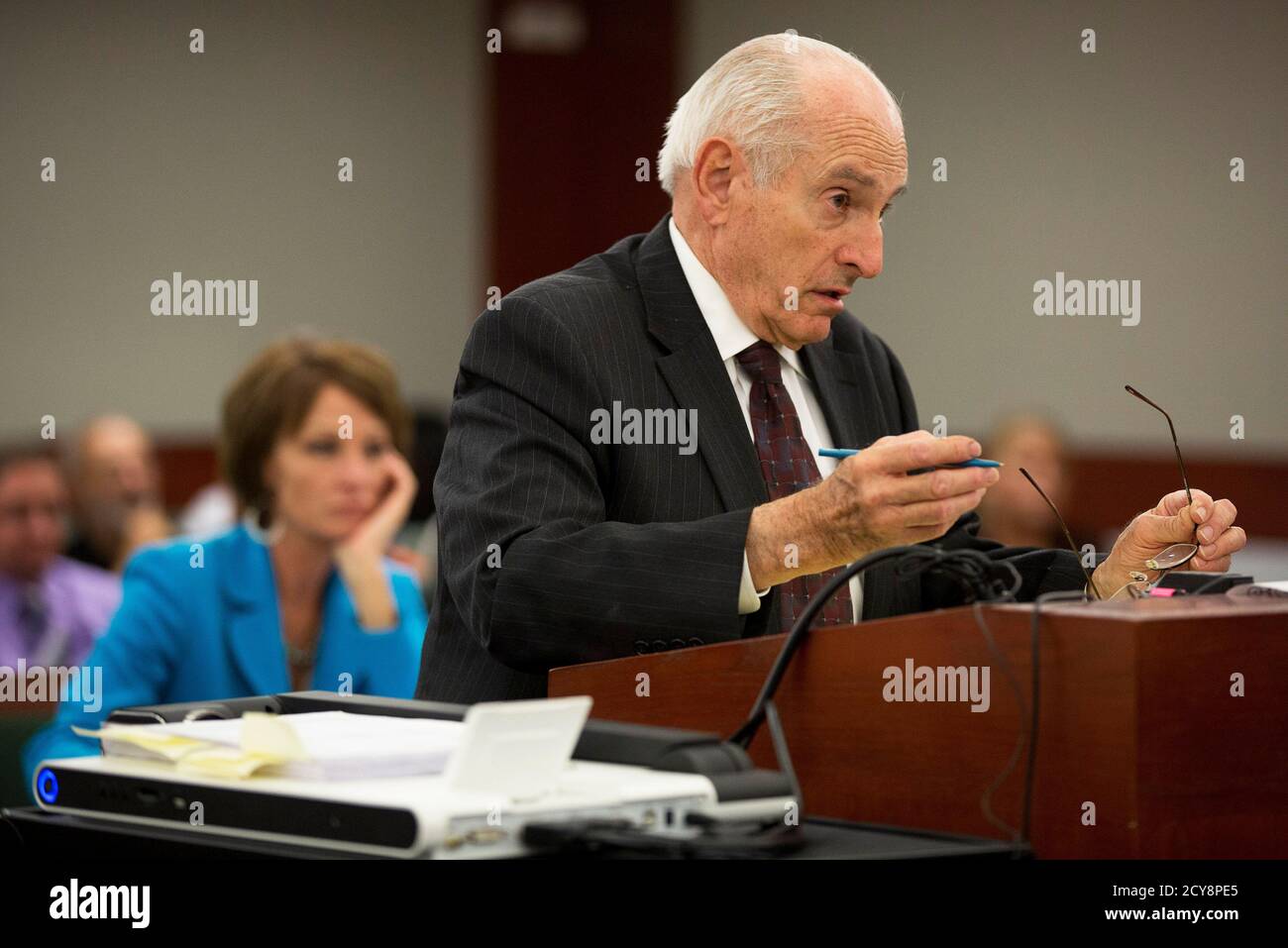 Chief deputy Clark County district attorney H. Leon Simon questions O.J. Simpson during an evidentiary hearing in Clark County District Court in Las Vegas, Nevada May 15, 2013. Simpson, who is currently serving a nine to 33-year sentence in state prison as a result of his October 2008 conviction for armed robbery and kidnapping charges, is using a writ of habeas corpus, to seek a new trial, claiming he had such bad representation that his conviction should be reversed.   REUTERS/Julie Jacobson/Pool  (UNITED STATES  - Tags: CRIME LAW SPORT ENTERTAINMENT) Stock Photo