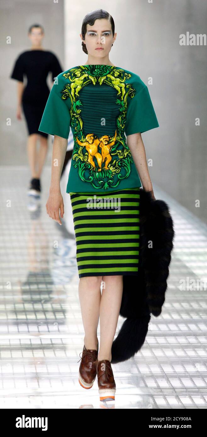 A model presents a creation as part of the Prada Spring/Summer 2011 women's  collection during Milan Fashion Week September 23, 2010. REUTERS/Alessandro  Garofalo (ITALY - Tags: FASHION Stock Photo - Alamy