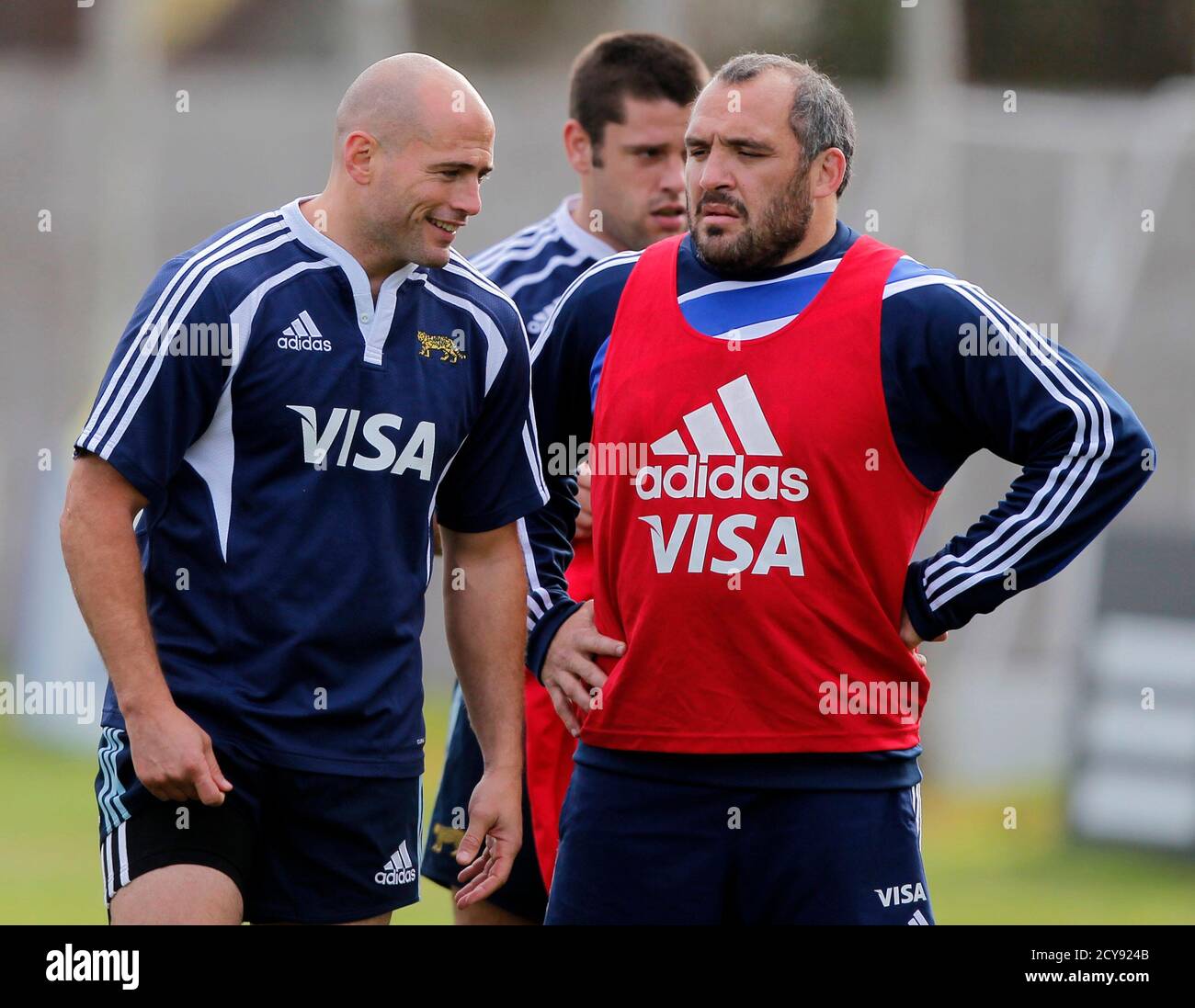 Felipe Contenpomi (L) of Argentina's Los Pumas talks with his teammate  Rodrigo Roncero during a training session ahead of their rugby test match  against the French Barbarians in Buenos Aires May 30,