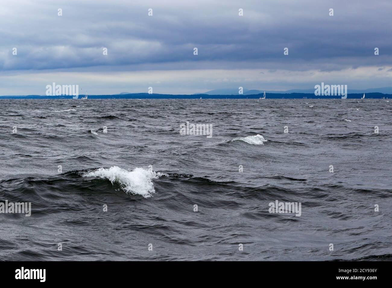 Waves on Lake Champlain with the horizon in the distance Stock Photo
