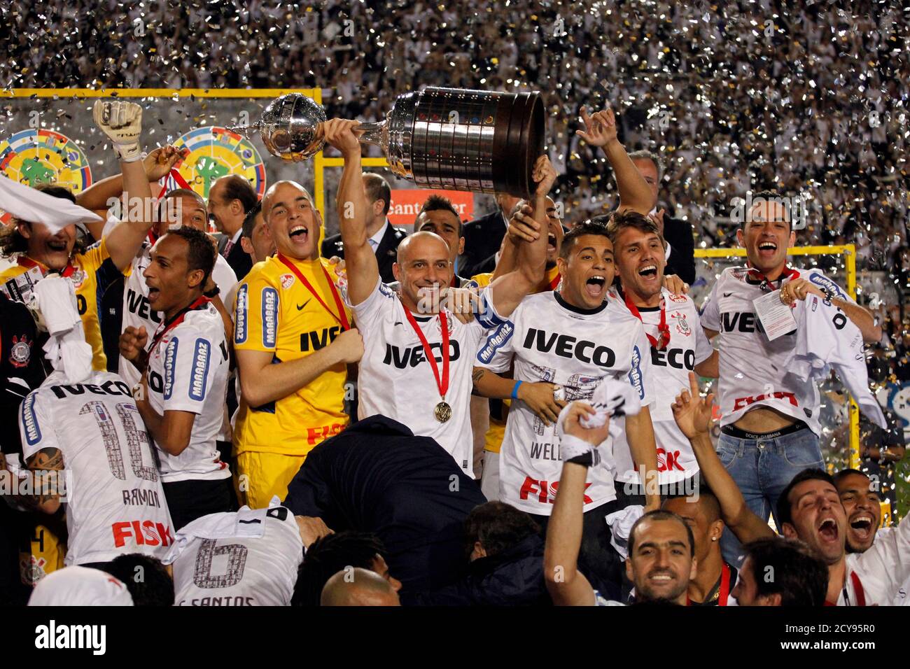 Players Of Brazil S Corinthians Celebrate With The Copa Libertadores Trophy At The Podium After They Beat Argentina S Boca Juniors In The Second Leg Final Soccer Match To Win The Championship In Sao