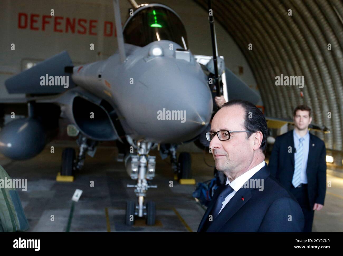 French President Francois Hollande speaks to pilots (not pictured) during a visit about nuclear deterrence and a strategic Air Force at the military base in Istres, southern France February 19, 2015.   REUTERS/Guillaume Horcajuelo/Pool   (FRANCE - Tags: POLITICS MILITARY) Stock Photo