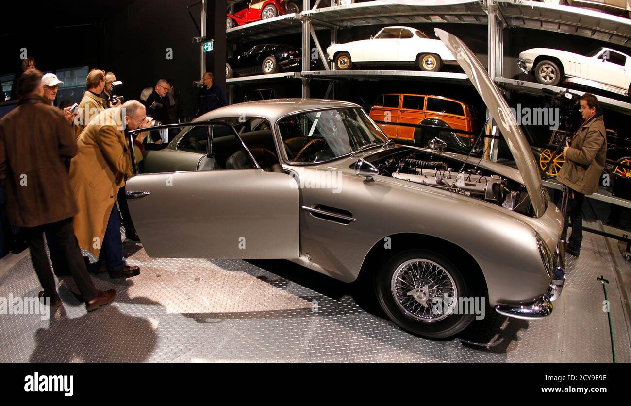 The 1964 Aston Martin DB5 made famous in the James Bond movies "Goldfinger"  and "Thunderball" which featured Scottish actor Sean Connery, is displayed  for the first time since a total restoration at