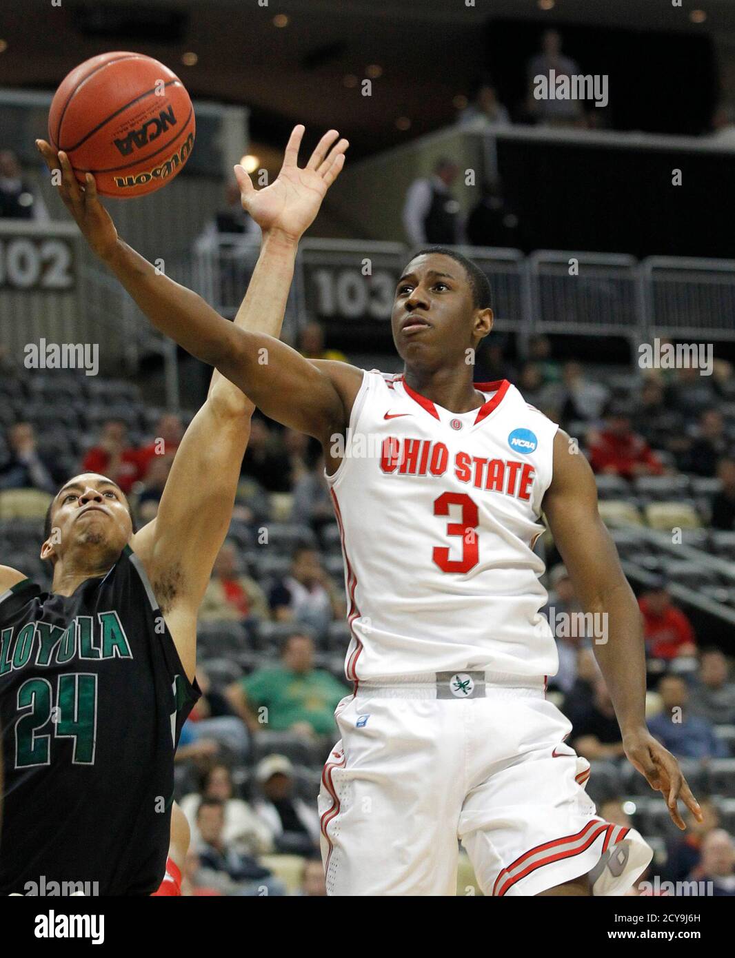 Ohio State University's Shannon Scott (3) scores against ...