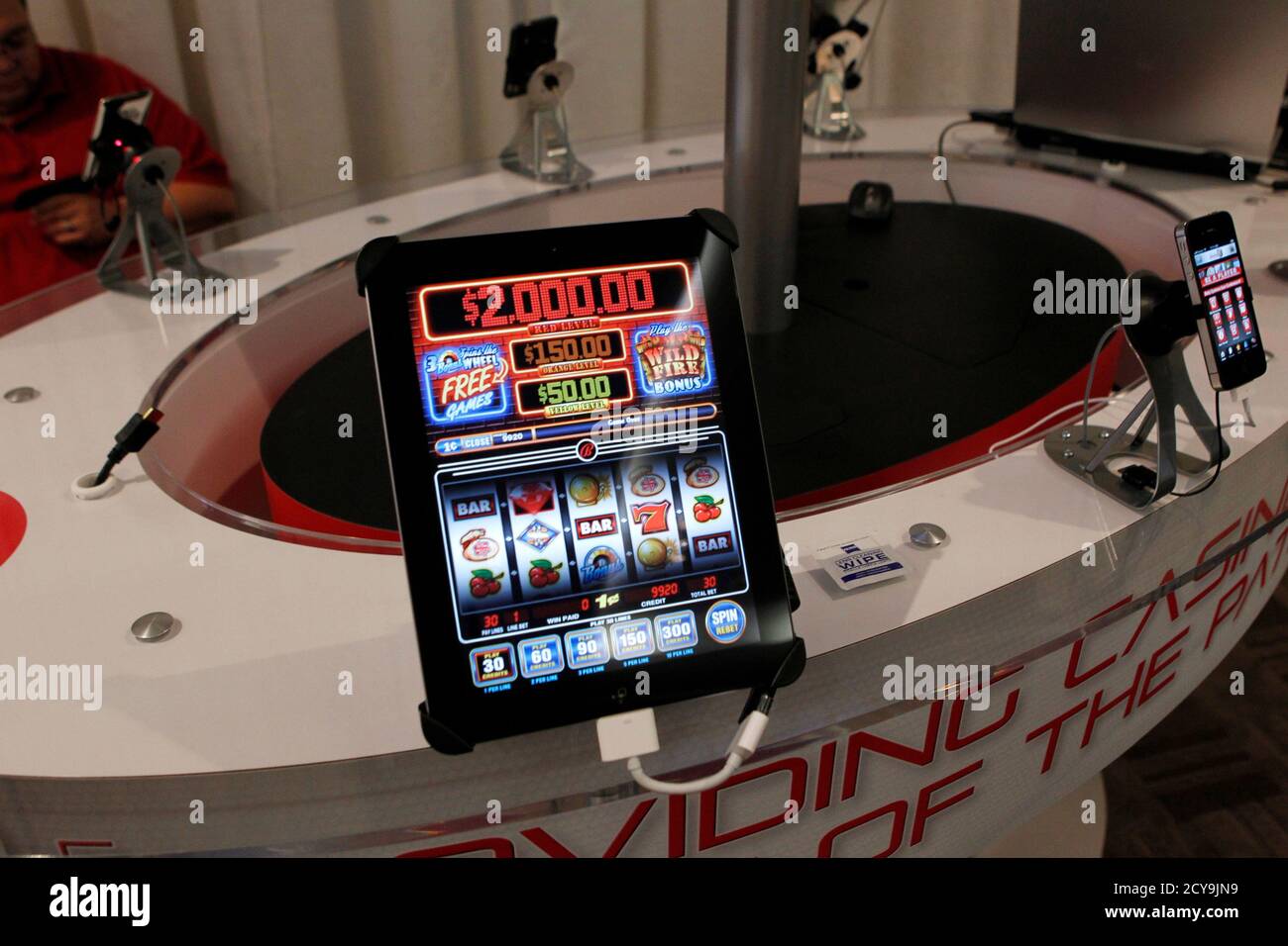 San Manuel Indian Bingo and Casino's online gambling app "Code Red" is demonstrated in the exhibitors room at the GiGse online gaming convention at the Westin hotel in San Francisco, California,