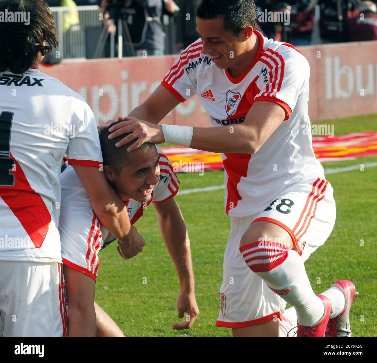River Plate S David Trezeguet Is Congratulated By His Teammates Rogelio Funes Mori R And Luciano Vella L After Trezeguet Scored His Team S First Goal During Their Argentine Championship Soccer Match Against Almirante