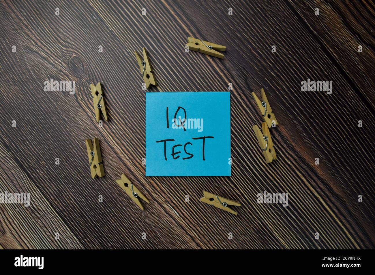 IQ Test write on sticky notes isolated on office desk. Stock Photo